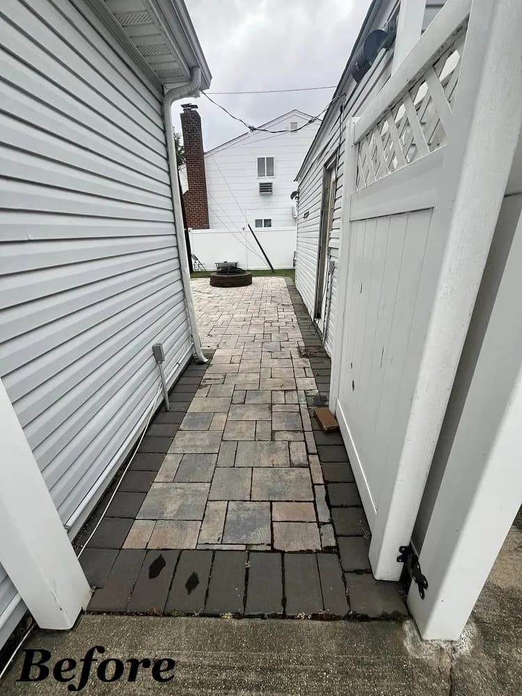 Before washing and sealant: walkway with heavy dirt stains