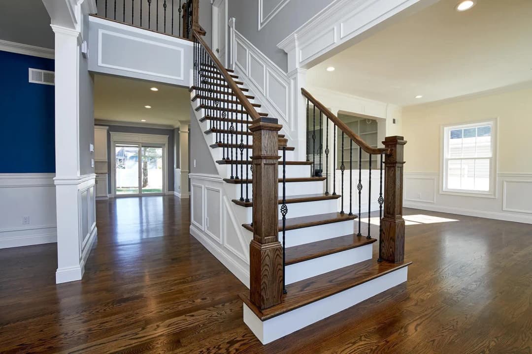 Modern wooden stairs with a sleek design and polished finish.