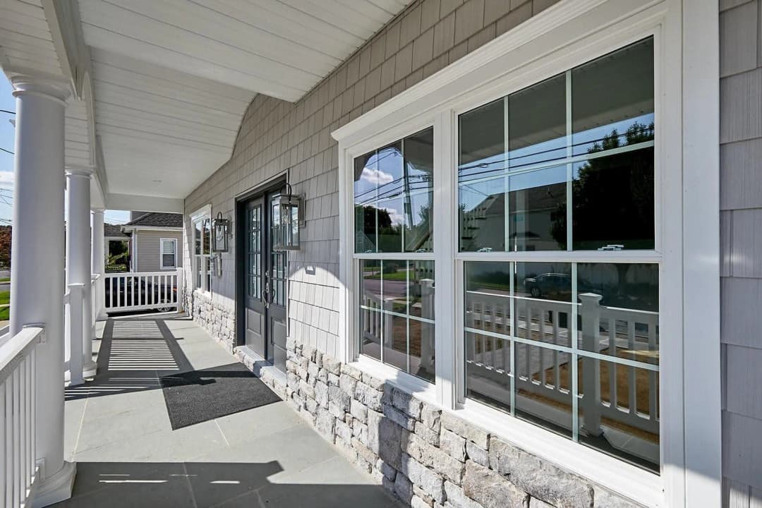 Large windows with a clear view of the outdoor landscape.