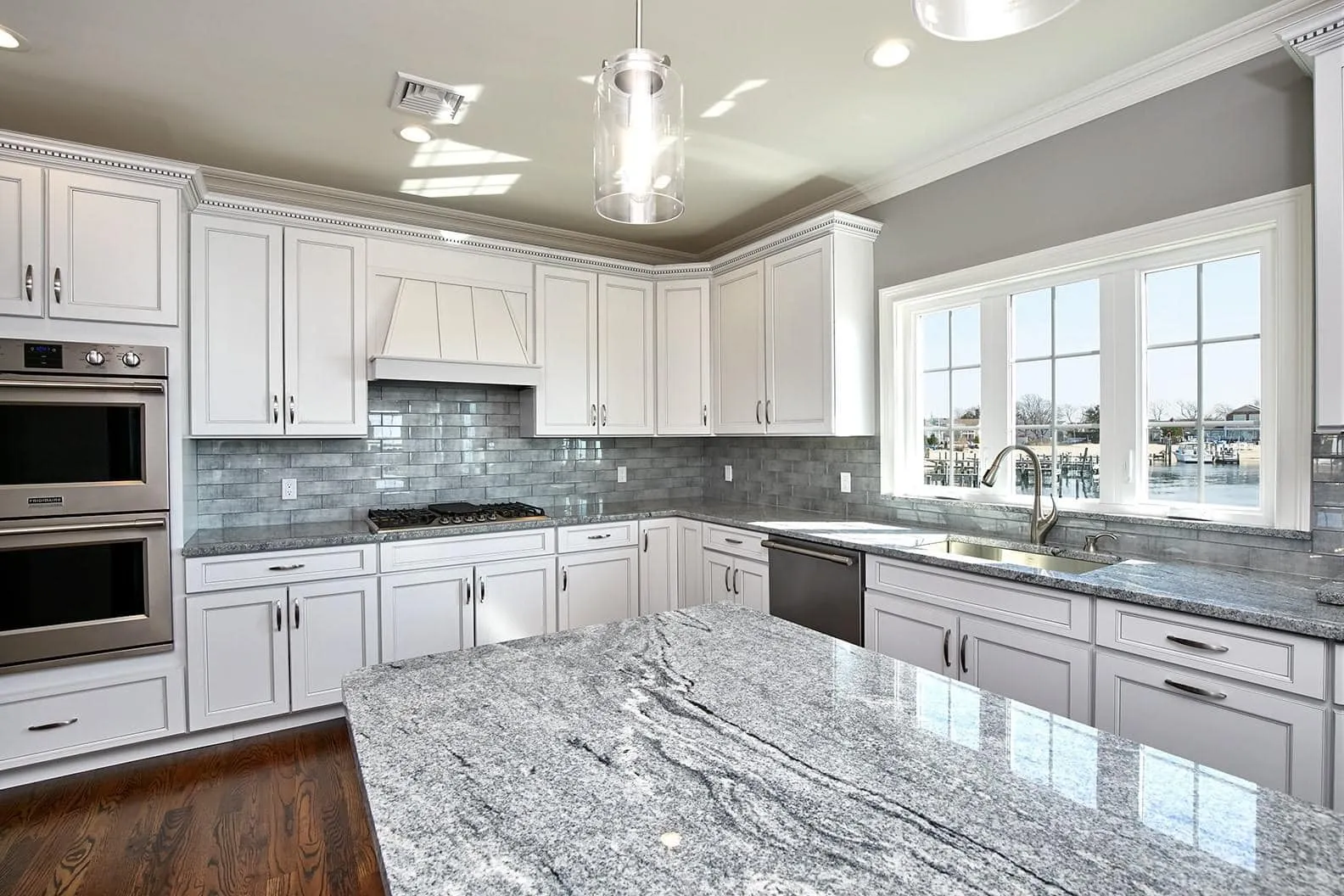 A modern kitchen with updated appliances and sleek countertops.